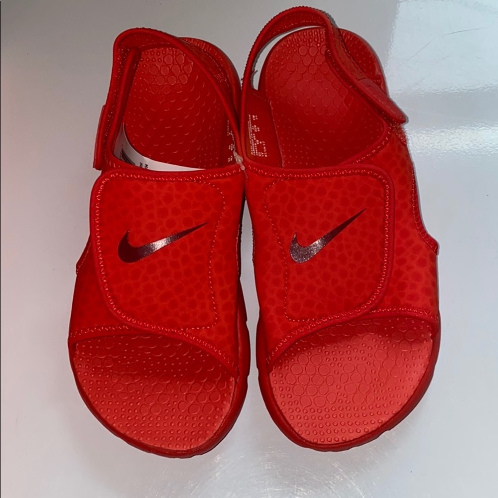 Brand new red Nike sandals